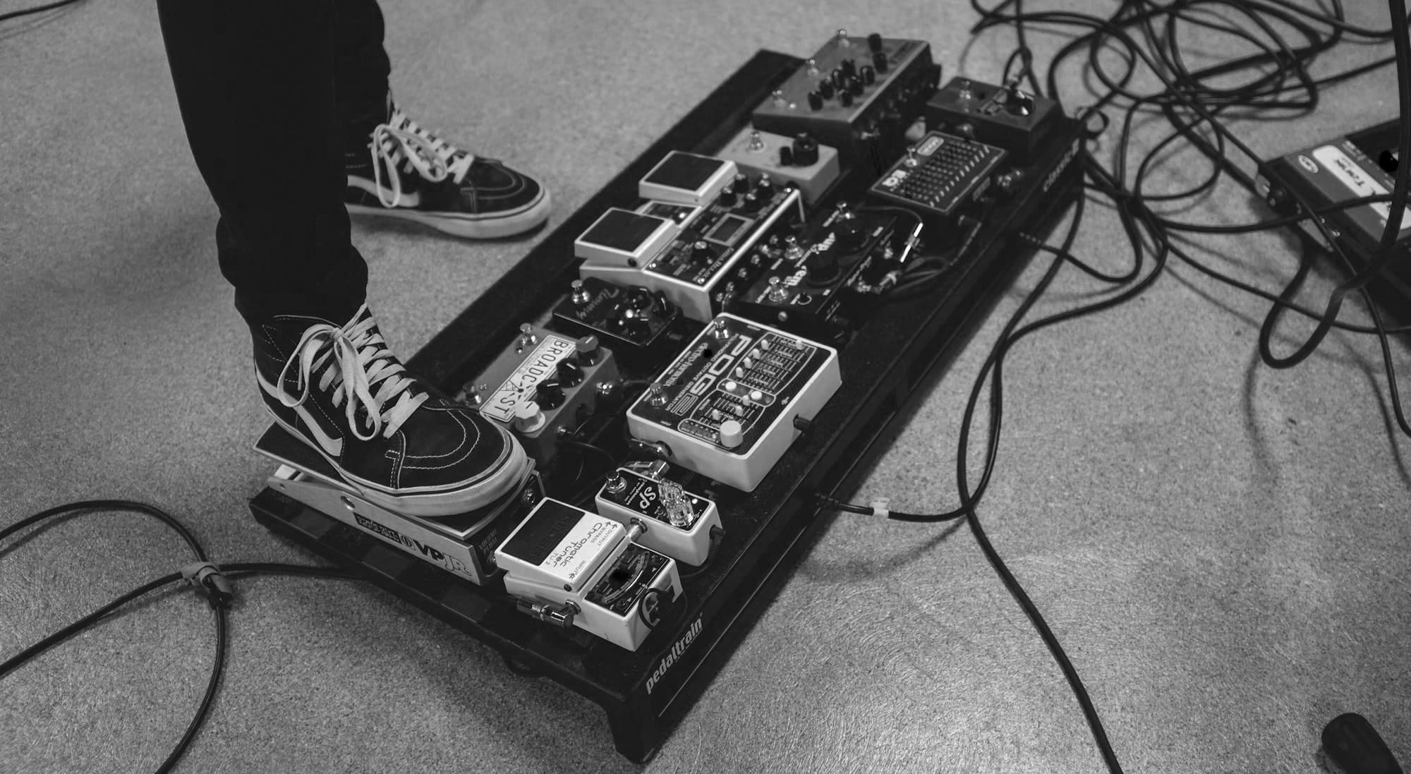 person wearing Vans old skool sneakers
