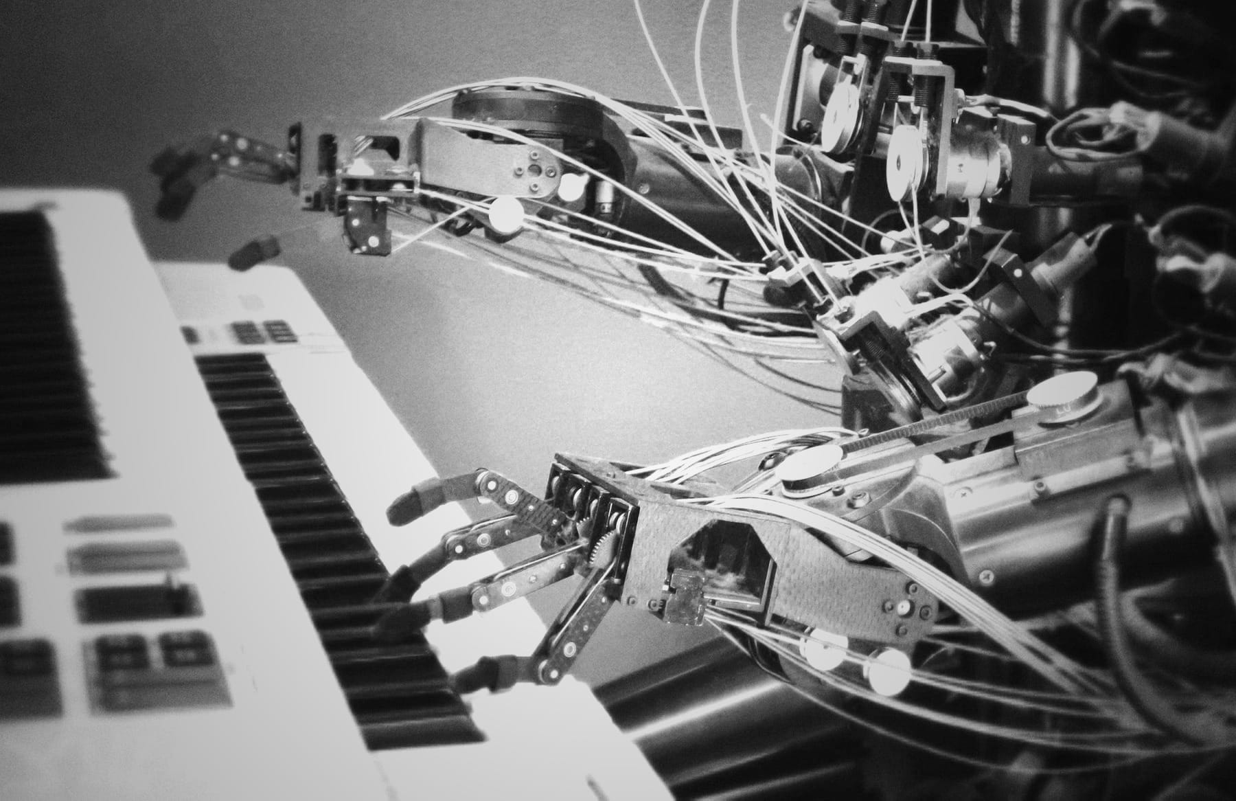 robot playing piano